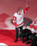 Nicklas Lidstrom waves to the crowd upon being introduced at Sergei Fedorov's jersey retirement ceremony.