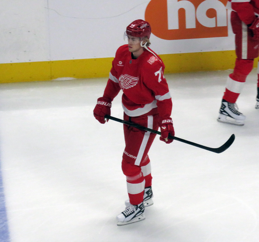 Simon Edvinsson of the Detroit Red Wings skates during pre-game warmups before a game against the Carolina Hurricanes, wearing a customized Sergei Fedorov jersey and white skates in honor of Fedorov's jersey retirement.