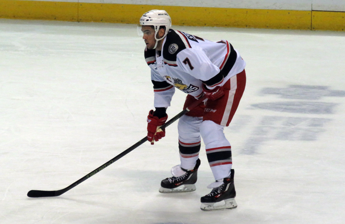 Ryan Sproul gets set for a faceoff during a Grand Rapids Griffins game.
