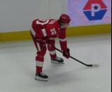 Albert Johansson of the Detroit Red Wings gets set for a faceoff during a game against the Carolina Hurricanes.