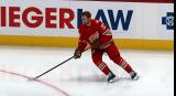 J.T. Compher of the Detroit Red Wings skates near the boards during pre-game warmups before a game against the Montreal Canadiens.