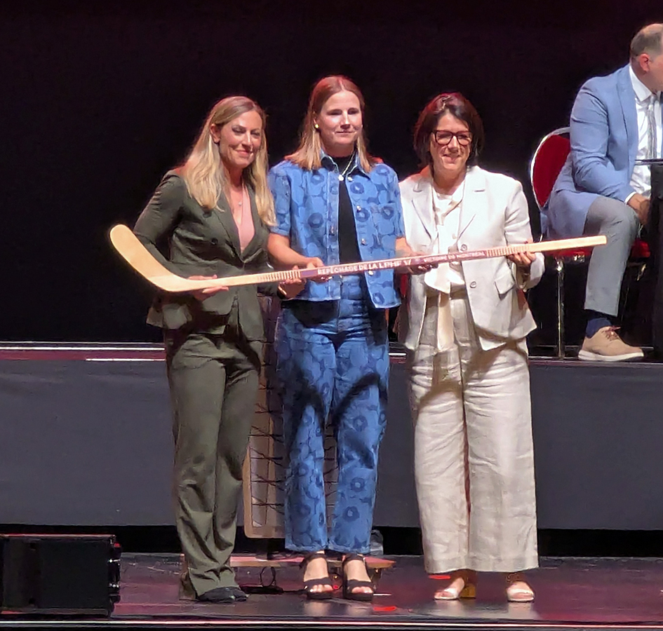 Petra Nieminen is selected twelfth overall at the 2026 PWHL Entry Draft, flanked by PWHL senior vice president Jayna Hefford and Montreal Victoire general manager Daniele Sauvageau.
