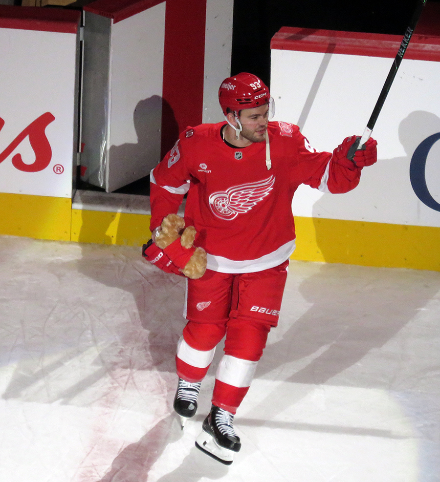 Alex DeBrincat of the Detroit Red Wings steps onto the ice as the second star of a game against the Carolina Hurricanes.