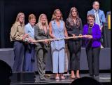 Lacey Eden is selected fifth overall at the 2026 PWHL Entry Draft, flanked by PWHL Las Vegas general manager Dominique Didia and members of the PWHL leadership team.