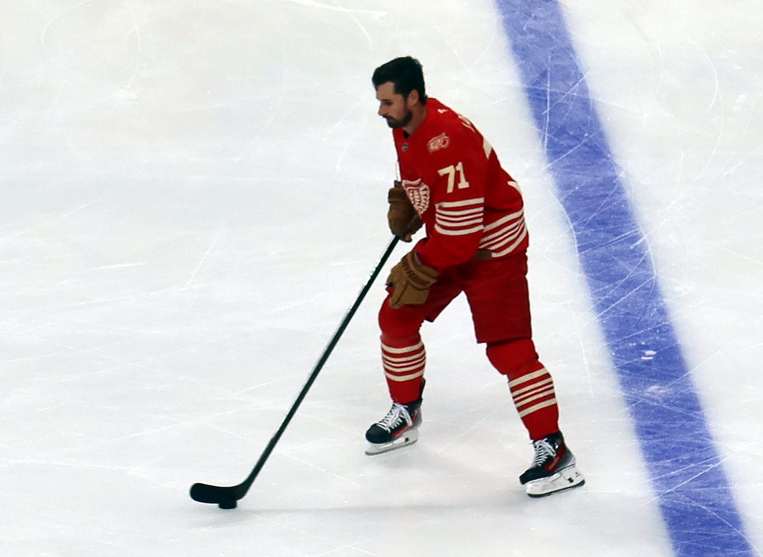 Dylan Larkin of the Detroit Red Wings skates at the blue line during pre-game warmups before a game against the Montreal Canadiens.