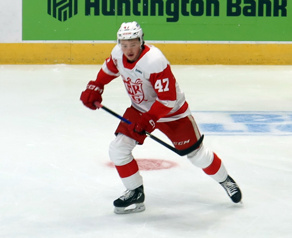 Alexandre Doucet of the Grand Rapids Griffins skates during pre-game warmups before a game against the Manitoba Moose.