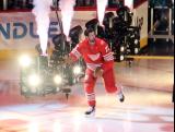 Dylan Larkin of the Detroit Red Wings skates out during player introductions before the team's home opener.