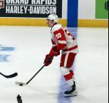 Ian Mitchell of the Grand Rapids Griffins skates across the blue line during pre-game warmups before a game against the Manitoba Moose.
