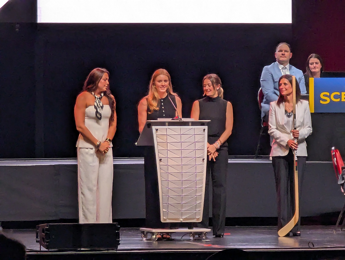 PWHL Detroit players Taylor Girard, Jesse Compher, and Daryl Watts join general manager Manon Rheaume to announce the team's fourth-round pick at the 2026 PWHL Entry Draft.