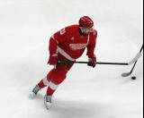 James van Riemsdyk of the Detroit Red Wings skates during pre-game warmups before a game against the Carolina Hurricanes, wearing a customized Sergei Fedorov jersey and white skates in honor of Fedorov's jersey retirement.
